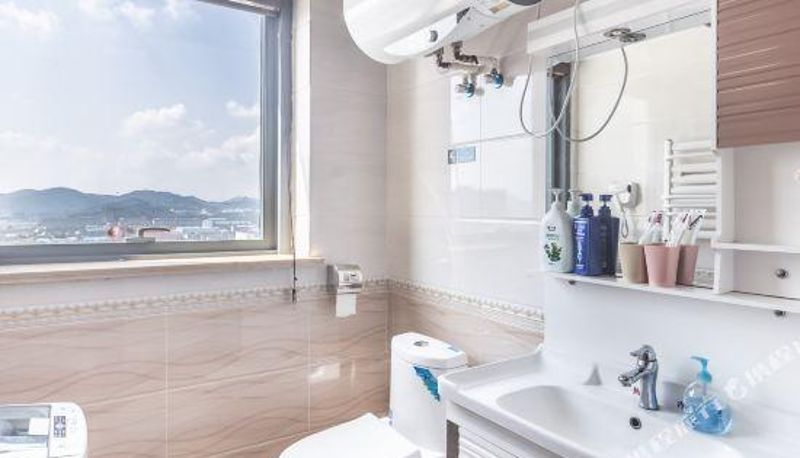 Pokój z widokiem na góry - Tuyuan Holiday Apartment (Weihai Railway Station Hanlefang West Street)