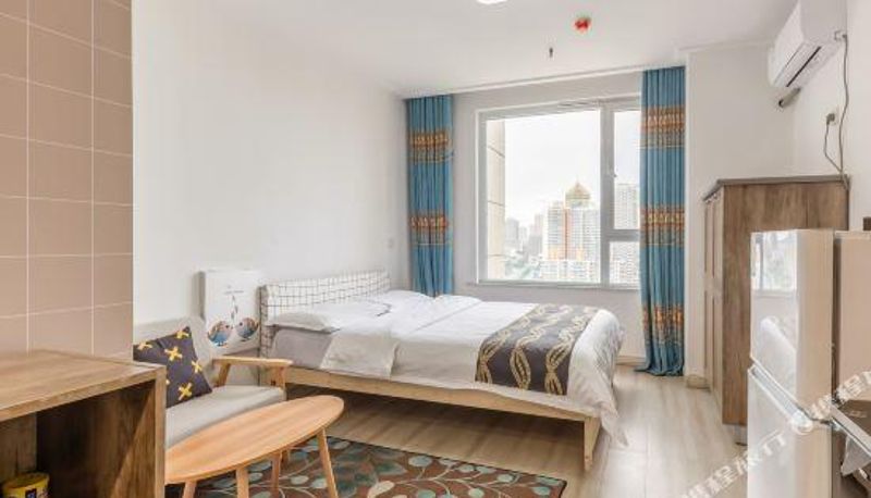 Room - Tule Boutique Holiday Apartment (Weihai Hanlefang Railway Station Store)