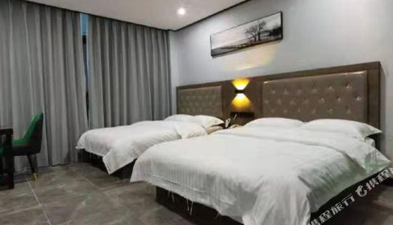 Zimmer - Sanhao Holiday Hotel (Wuhan Nanshan Optics Valley Free Trade Port Foxconn Technology Park Branch)