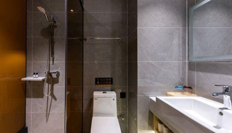 Zimmer - Fengyuan Hotel (Wuhan Happy Valley Garden Road Subway Station)