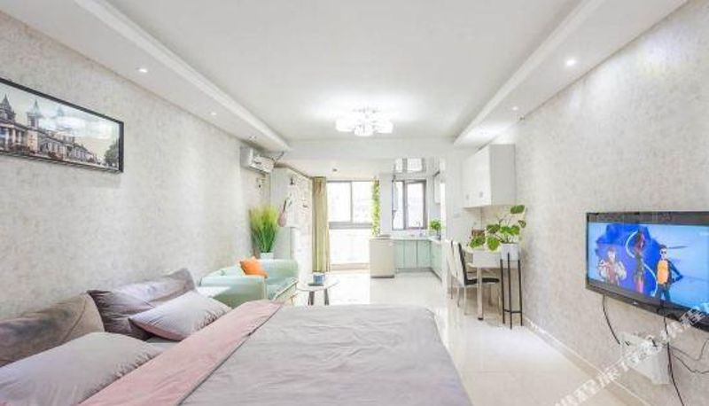 Zimmer - Tangguo Shangpin Hotel (Wuhan Jianghan Road Pedestrian Street)