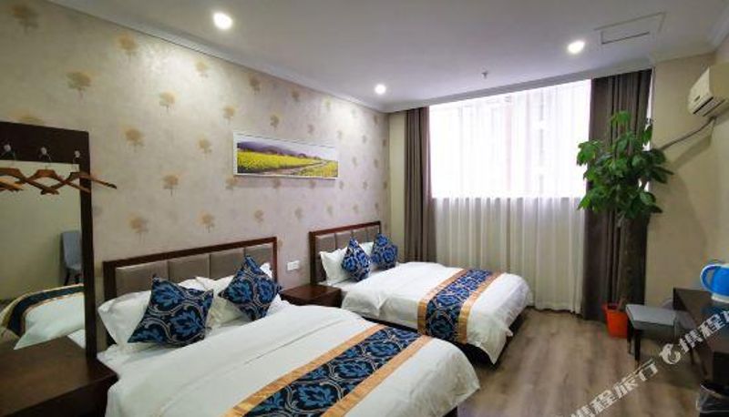 Habitación - Tianxin Business Hotel