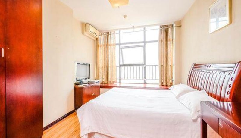 Innenbreich - New Time Apartment Hotel Wuhan Wuguang