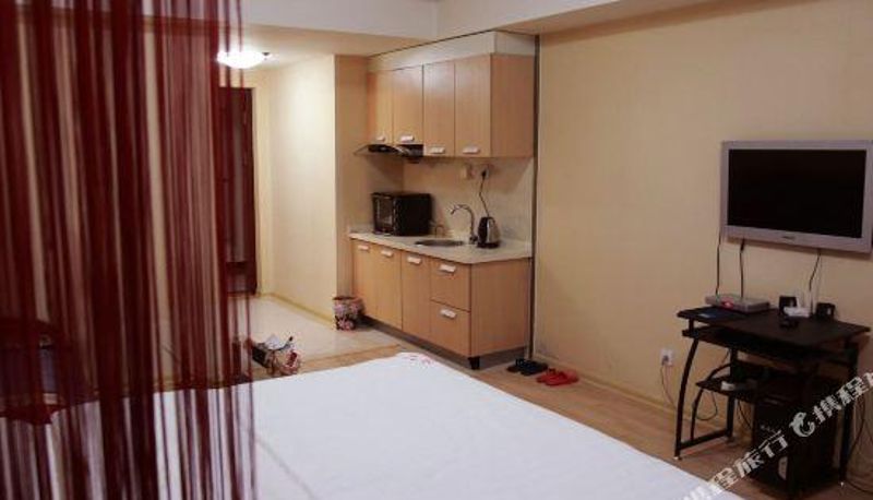 Habitación - Tangguo Apartment