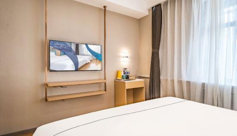 Zimmer - Magnolia Hotel (Shijiazhuang Letai Center Ping'an Street Subway Station)