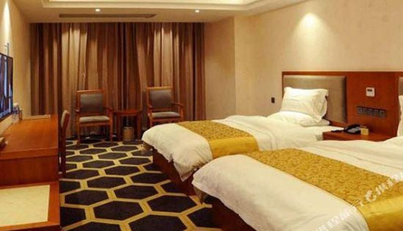 Business-Zimmer - Ruili Golden Brick Hotel
