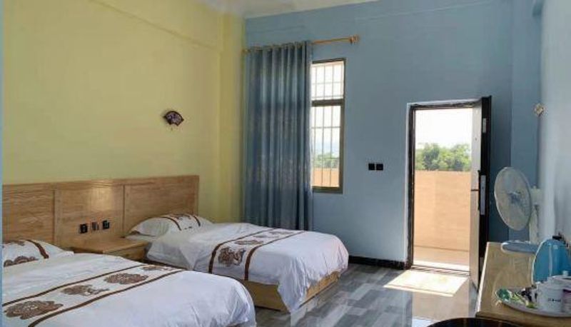 Habitación - Ruili Zhuyunxuan Apartment
