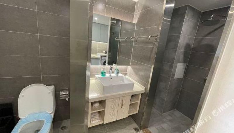 Zimmer - Ruili Holiday Inn Apartment (Fortune Plaza)
