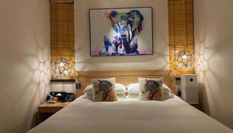 Zimmer - Wonderland Hotel (Nanyang Jianye Kaixuan Plaza)