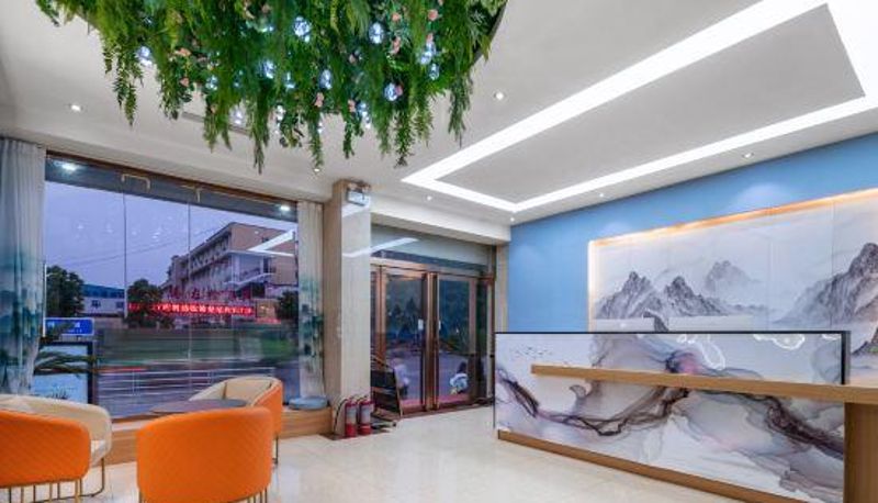 Rezeption - Yixuan Hotel (Nanyang Railway Station Wolonggang Branch)