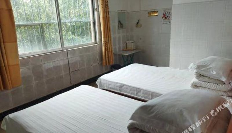 Habitación - Nanning Luoyi Hostel