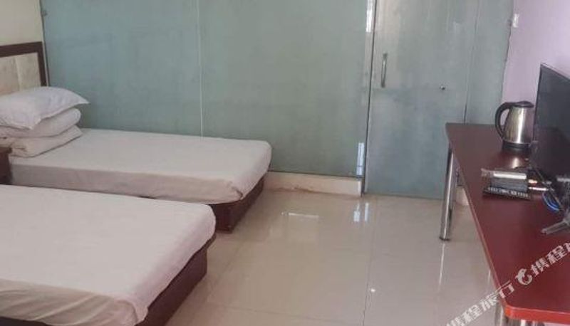 Chambre - Dacheng Business Inn
