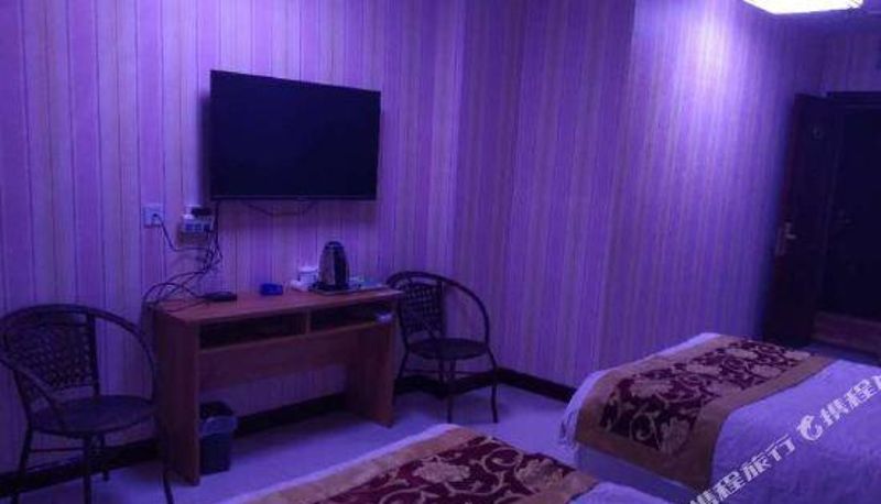 Habitación familiar - Korla Western Heina Hotel