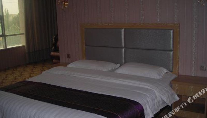 Habitación - Korla Rixin Hotel
