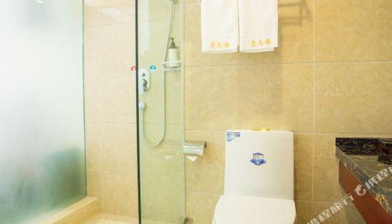 Kamer met balkon - Jinglong Dai Holiday Hotel
