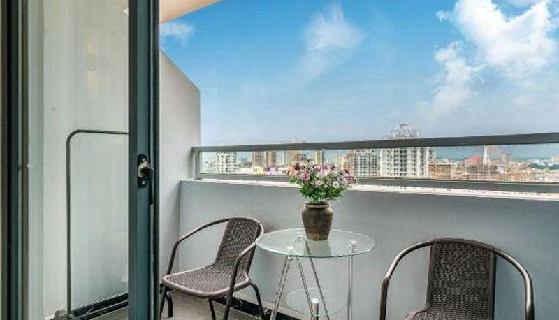 Kamer met balkon - Twin Towers Hotel (Xishuangbanna Xingguang Night Market)