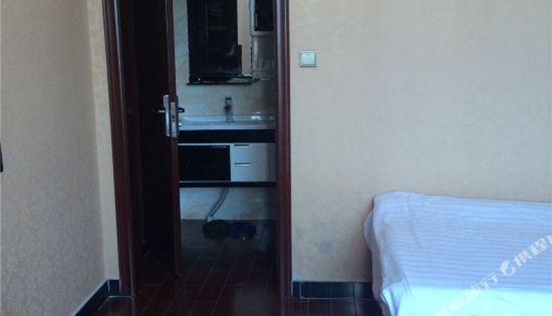 Zimmer - Zhendong Business Hotel