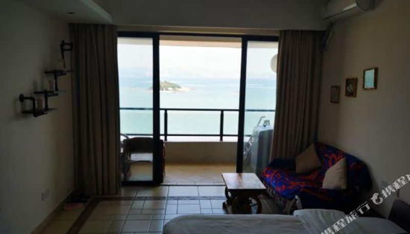 Pokój z widokiem na morze - Hailanshi Holiday Apartment (Huizhou Paopaohai)
