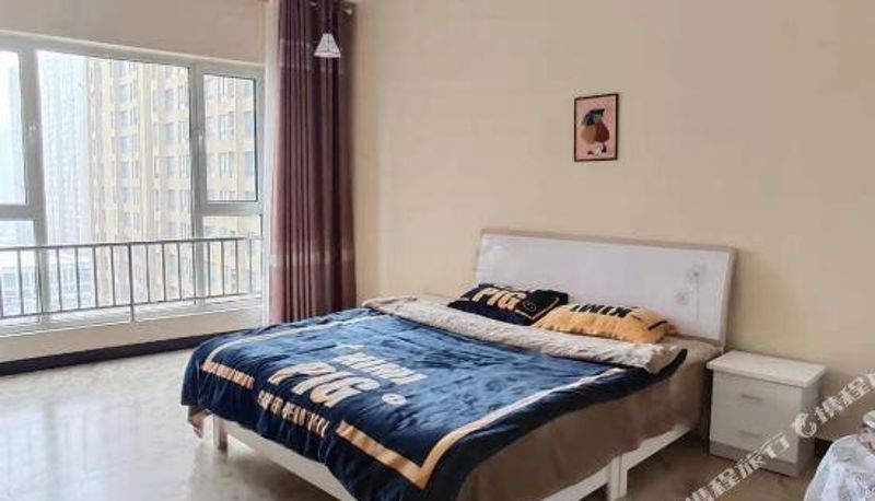 Zimmer - Fuxin Getiao Apartment (Zhaodu China Resources Mansion)