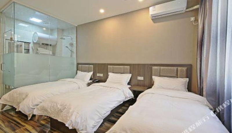 Zimmer - Qinglv Business Hotel