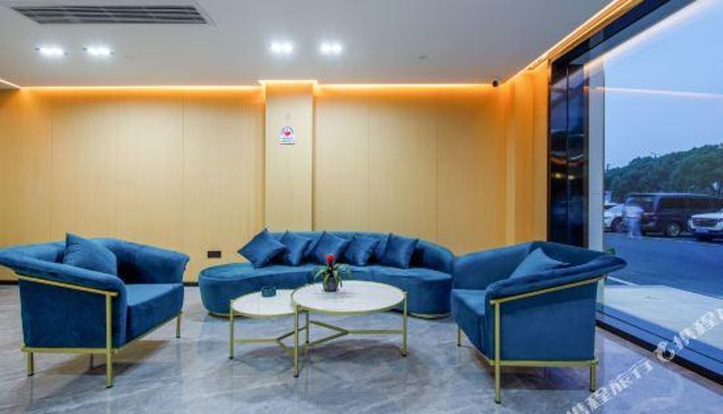 Receptie - Xinyi Boutique Hotel (Aoti Qinglong Gymnasium Shop)