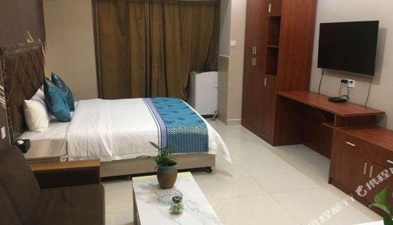 Business-kamer - Xingzhe Kaitong Apartment Hotel