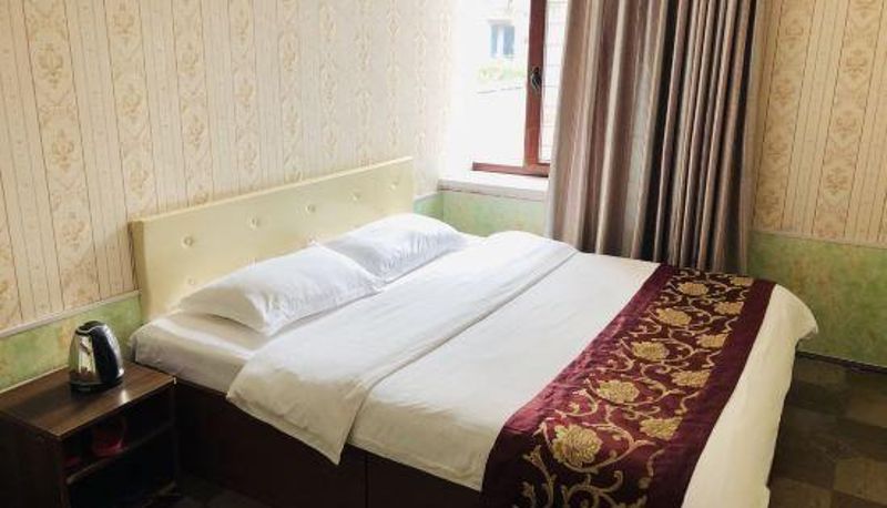 Zimmer - Donghua Bohai Fashion Hotel