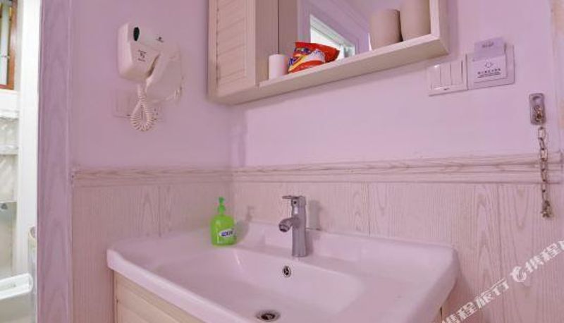 Zimmer - Qionghai Wanziqianhong Serviced Apartment