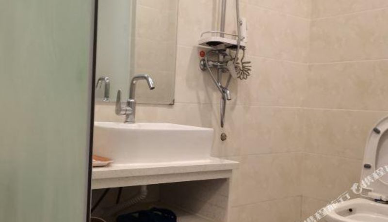 Pokój z balkonem - Sanya Yiting Business Travel Rental (Hailv Duty Free Eternal Love)