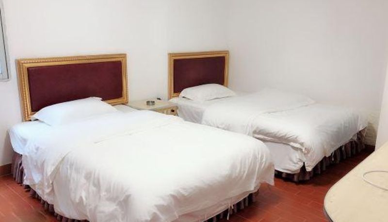 Habitación - Muxian Hotel