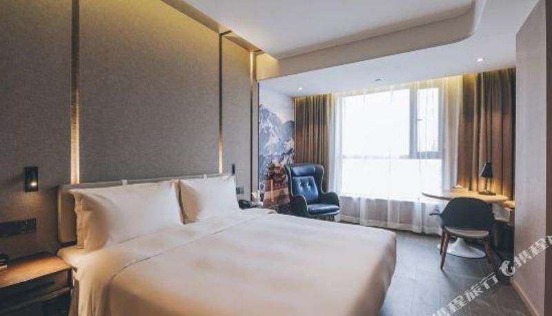 Zimmer - Jinfeng Hotel (Youtehui Jinxin)