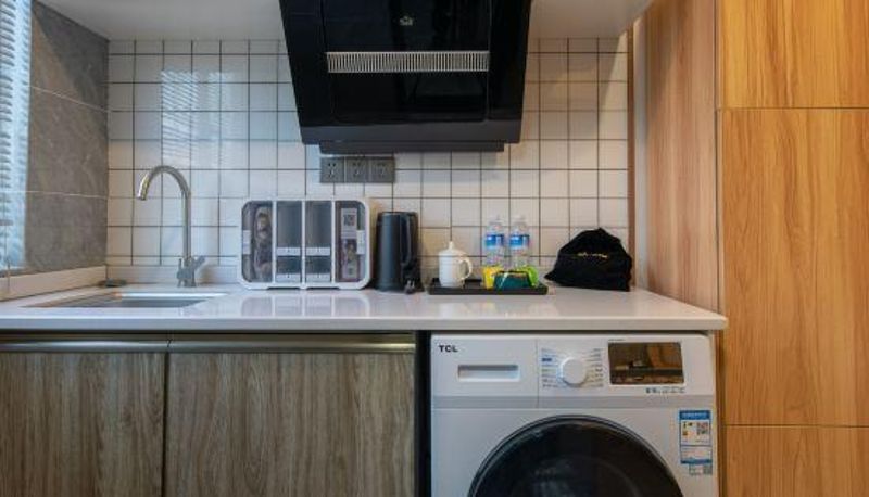 Camera - Liguang Business Hotel Apartment