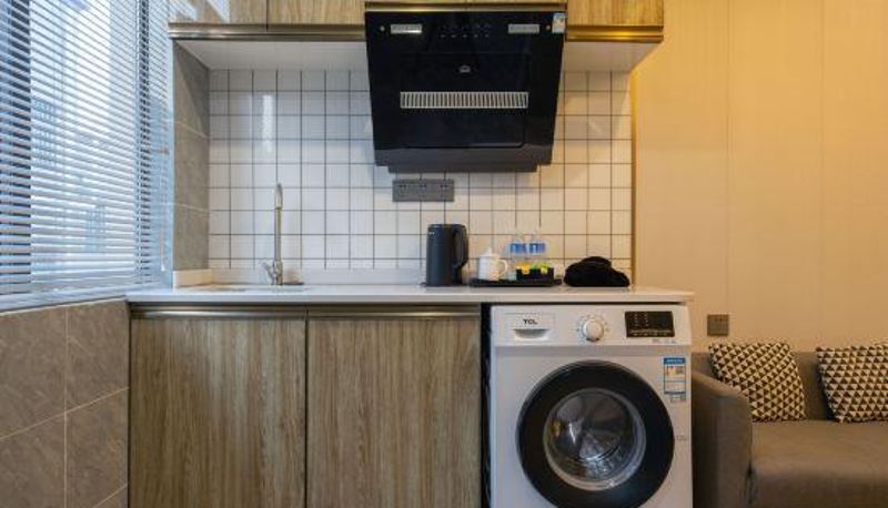 Camera - Liguang Business Hotel Apartment