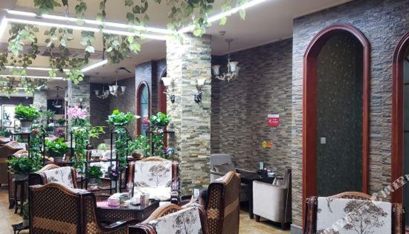 Zona de bienestar y gimnasio - Le Yi Hotel (Mixc store)