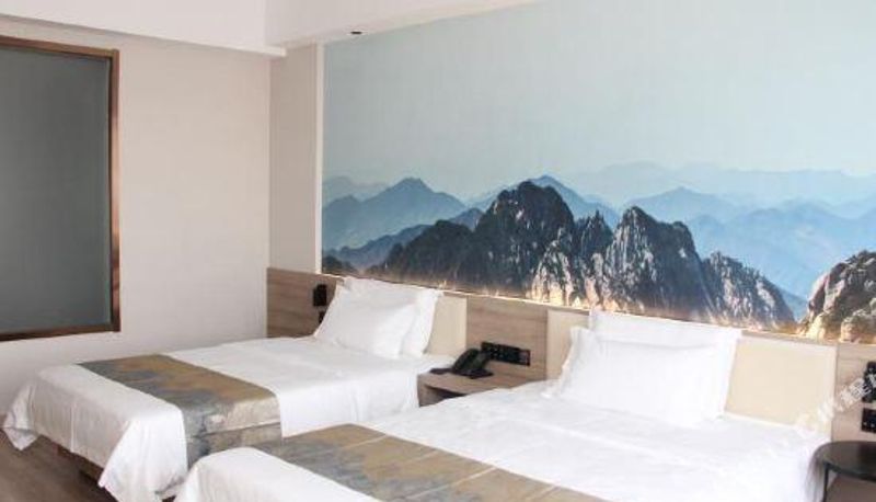 Habitación familiar - Home Inn Ruibaiyun Hotel (Qingdao Boli Metro Station)