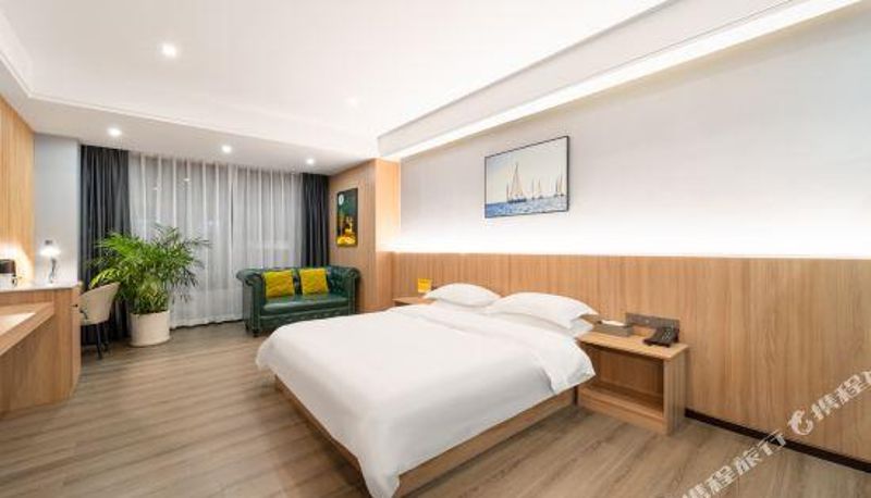 Zimmer - Huiting Hotel (Jiangjin Wanda Plaza Shengquansi Subway Station)