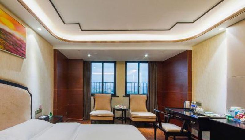 Chambre - Caifu Holiday Hotel