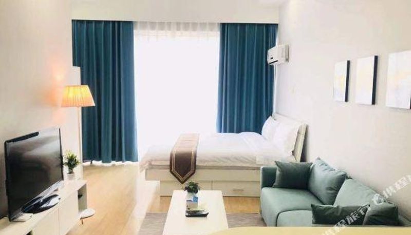 Zimmer - Aocheng Apartment Hotel