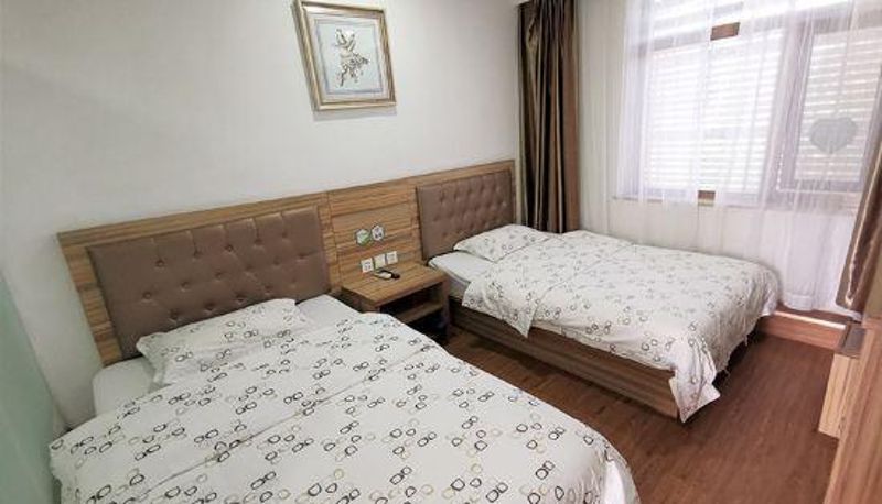 Habitación - 99inn Selected Hotel