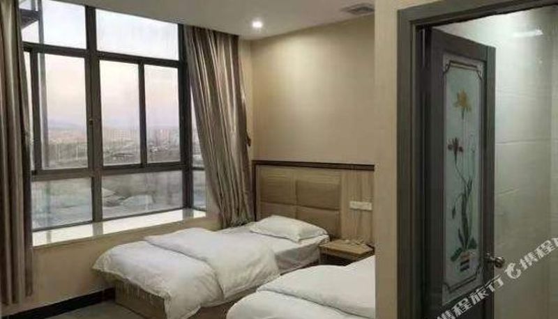Camera - Shantou Xinyue Boutique Apartment