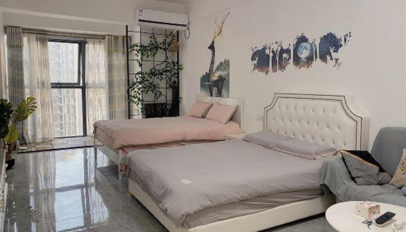 Room - Duoguo Qingju Apartment (Liuzhou Diwang International Wealth Center Bubugao Plaza Store)