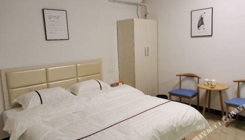 Camera - Huizhou Meiqing Business Apartment