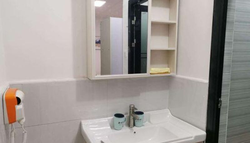 Camera - Huizhou Meiqing Business Apartment
