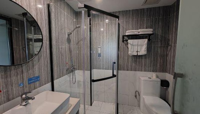 Habitación - Shangkeyou Hotel (Guangcai Market Store of Anqing High Speed Railway Station)