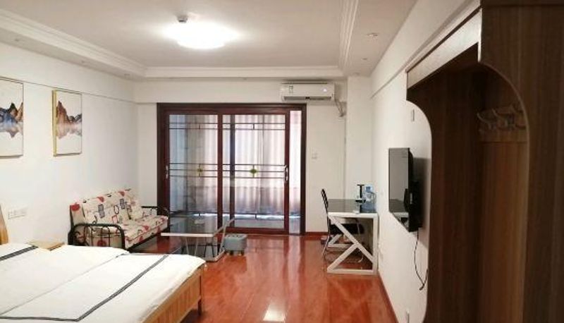 Camera con balcone - Luguo Impression Apartment (Qufu Bus Station)