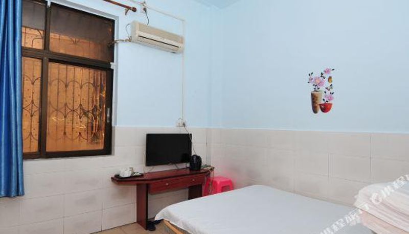 Vista interna - Wanning Hegang Guest Room