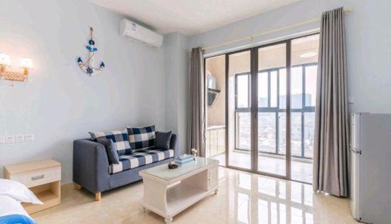 Zimmer - Aosidun Theme Holiday Apartment (Guangzhou Dashi Metro Station)