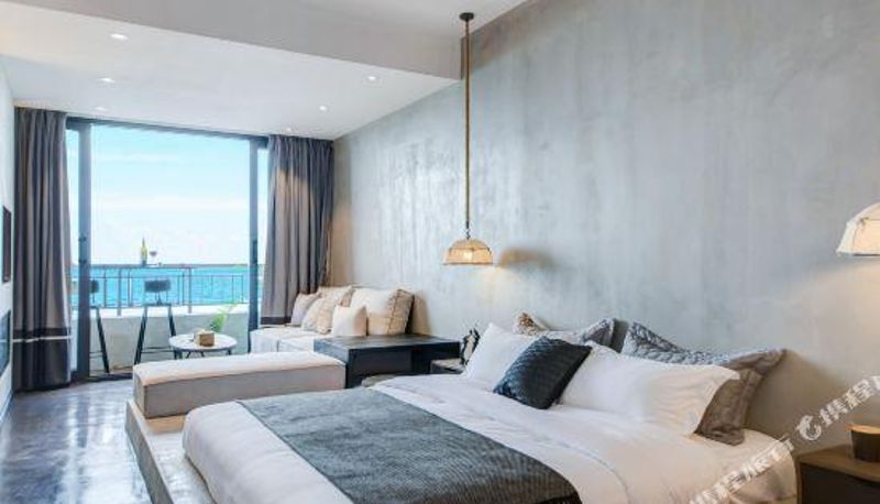 Habitación con vistas al mar - ALONG Inn.