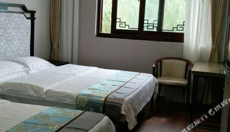 Camera per famiglia - Wuxi Xinhongxin Hotel