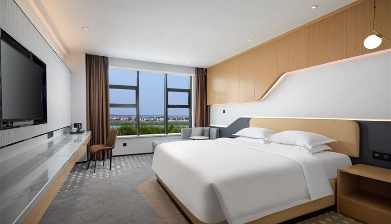Zimmer - Microtel by Wyndham Miluo Downtown Hotel